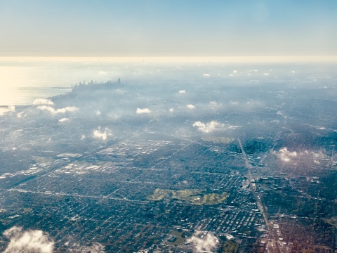 Chicago skyline from a plane, through thin clouds